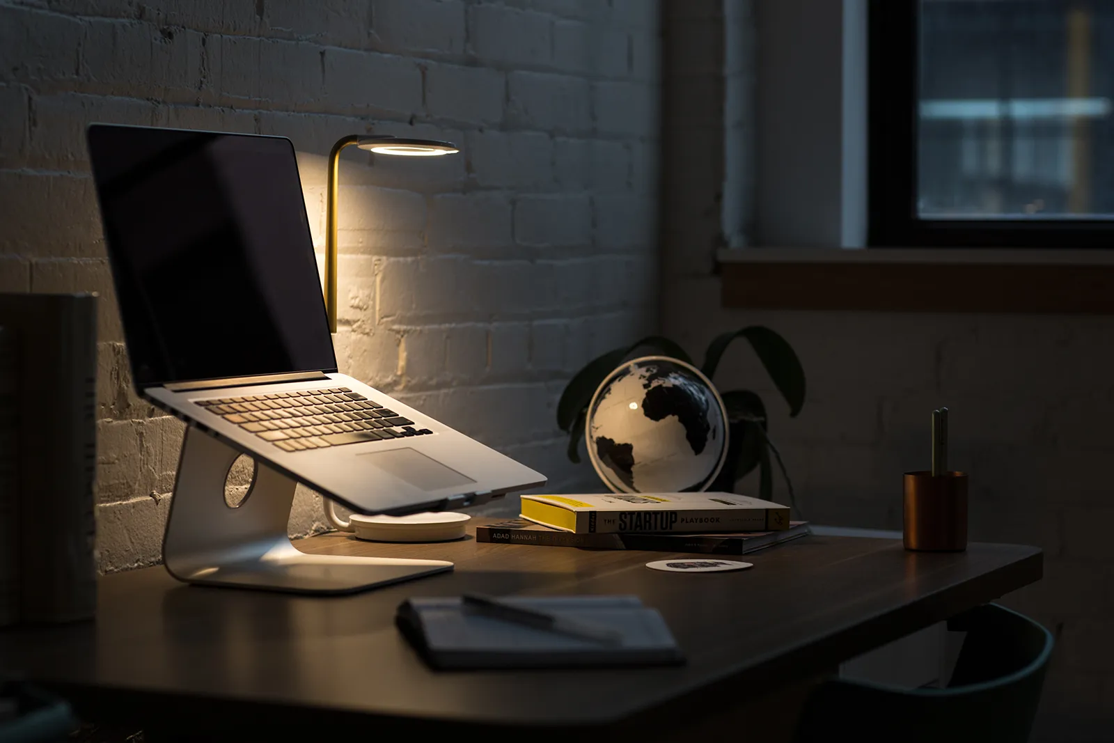 Laptop on desk at night